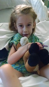 Callie and "Foxy," her favorite stuffed animal, before heading home.